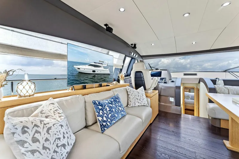 Slide: The Image of Luxurious interior of 2013 Ferretti Yachts 620 with elegant seating and modern design. - 18