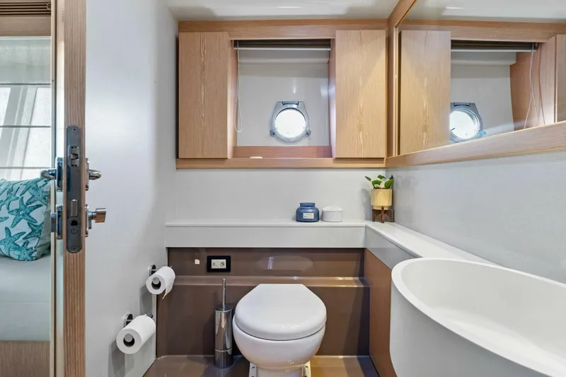 Slide: The Image of Luxurious bathroom in 2013 Ferretti Yachts 620, featuring modern fixtures and elegant design. - 26