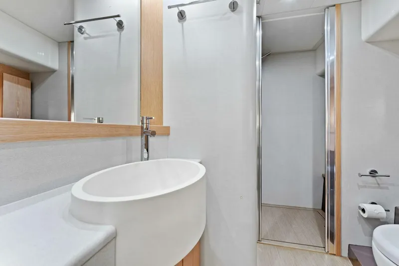 Slide: The Image of Modern bathroom interior on 2013 Ferretti Yachts 620, featuring sleek design and fixtures. - 35