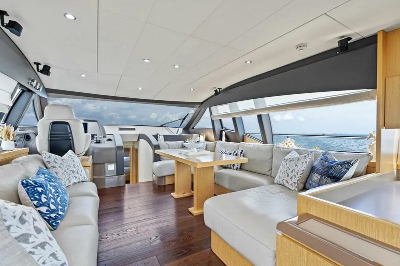 Slide: The Image of Luxurious interior of 2013 Ferretti Yachts 620 with elegant seating and ocean view. - 4