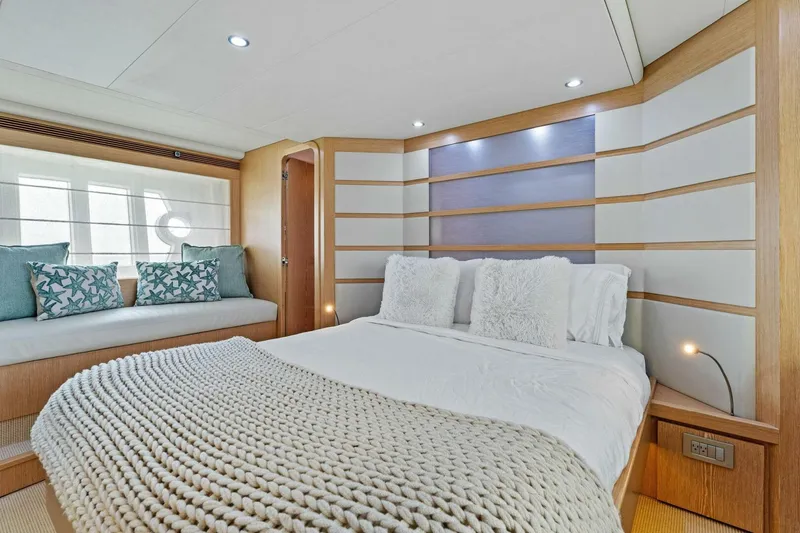 Slide: The Image of Luxurious bedroom interior of 2013 Ferretti Yachts 620 with modern design and cozy bedding. - 6