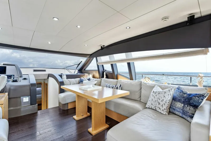 Slide: The Image of Luxurious interior of 2013 Ferretti Yachts 620 with elegant seating and ocean view. - 16