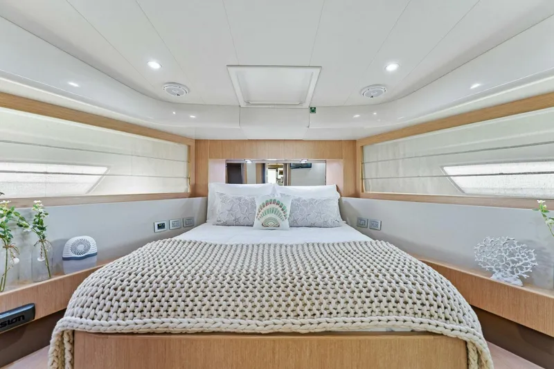 Slide: The Image of Luxurious bedroom interior of 2013 Ferretti Yachts 620 with elegant decor and cozy bedding. - 30