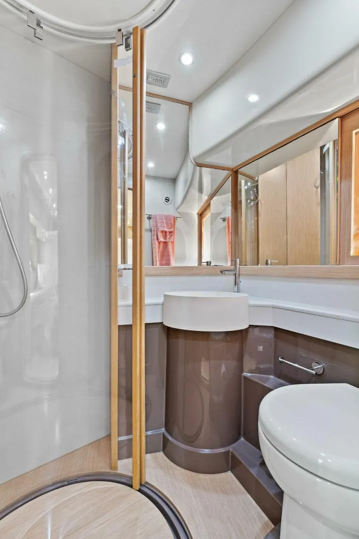 Slide: The Image of Luxurious bathroom in 2013 Ferretti Yachts 620, featuring modern fixtures and elegant design. - 39