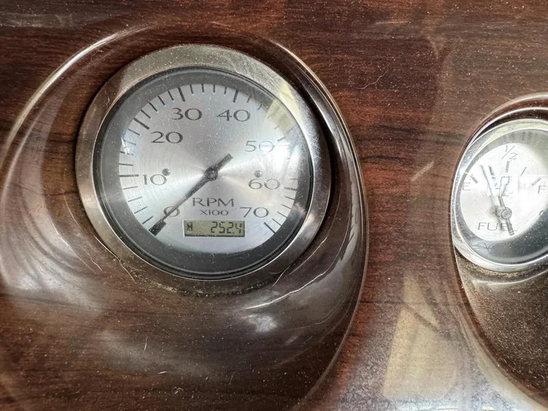 Slide: The Image of Close-up of 2014 Bennington 22 SSX boat RPM gauge displaying 252.9 hours. - 11