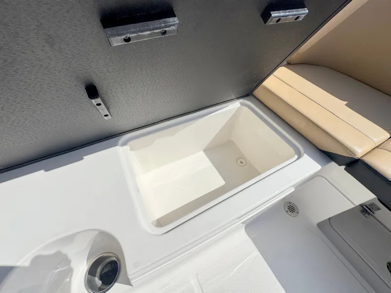 Slide: The Image of 2022 Sea Ray SPX 230 OB boat interior storage compartment. - 30