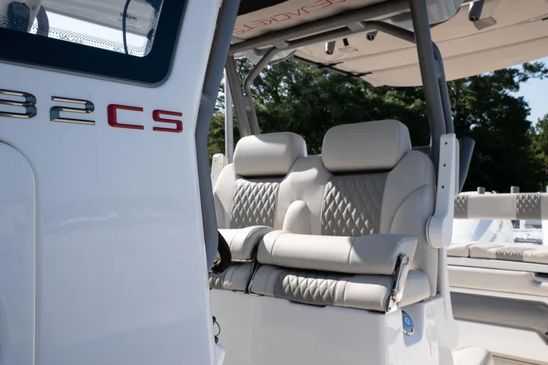 Slide: The Image of 2026 Solace 32 CS boat interior with luxurious seating and sleek design. - 28