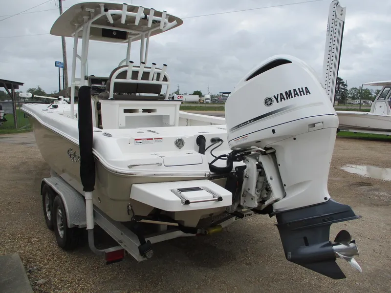 Slide: The Image of 2020 Crevalle 26 HCO boat with Yamaha outboard motor on a trailer. - 10