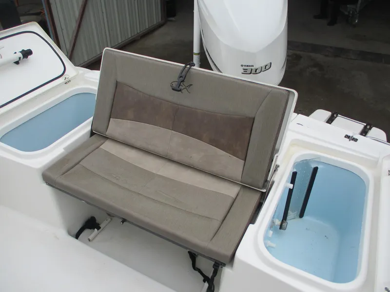 Slide: The Image of 2020 Crevalle 26 HCO boat seating and storage compartments. - 20