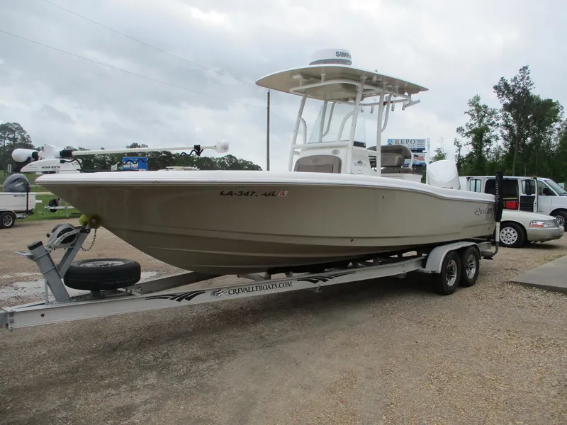 Slide: The Image of 2020 Crevalle 26 HCO boat on trailer, parked outdoors. - 3