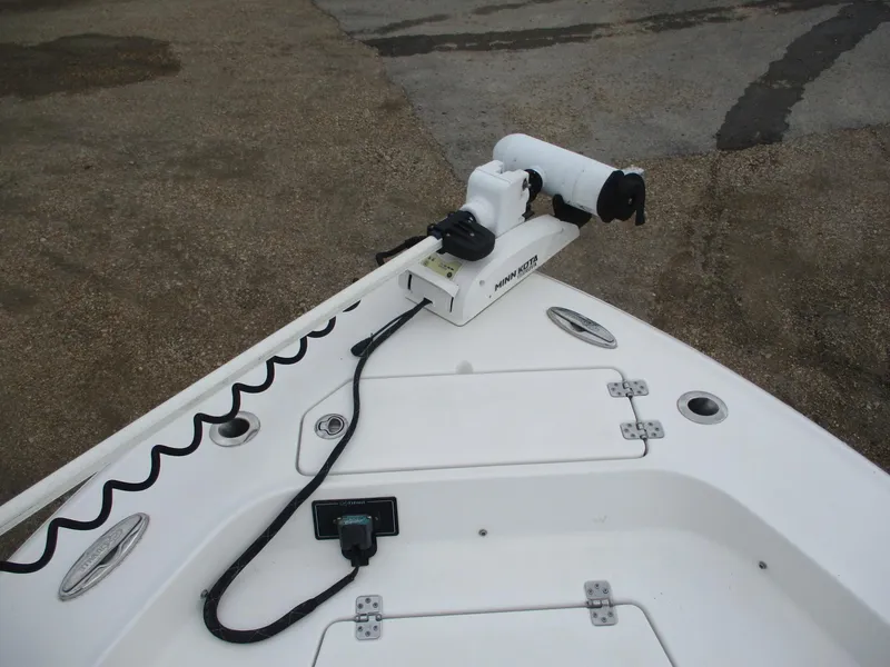 Slide: The Image of 2020 Crevalle 26 HCO boat with mounted trolling motor on deck. - 5