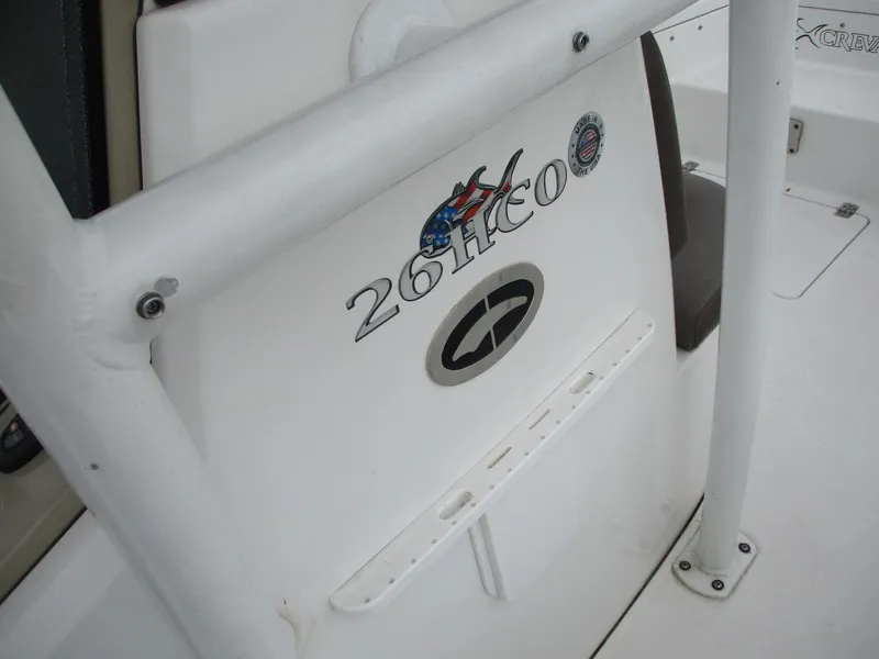 Slide: The Image of 2020 Crevalle 26 HCO boat interior with logo and branding details. - 8