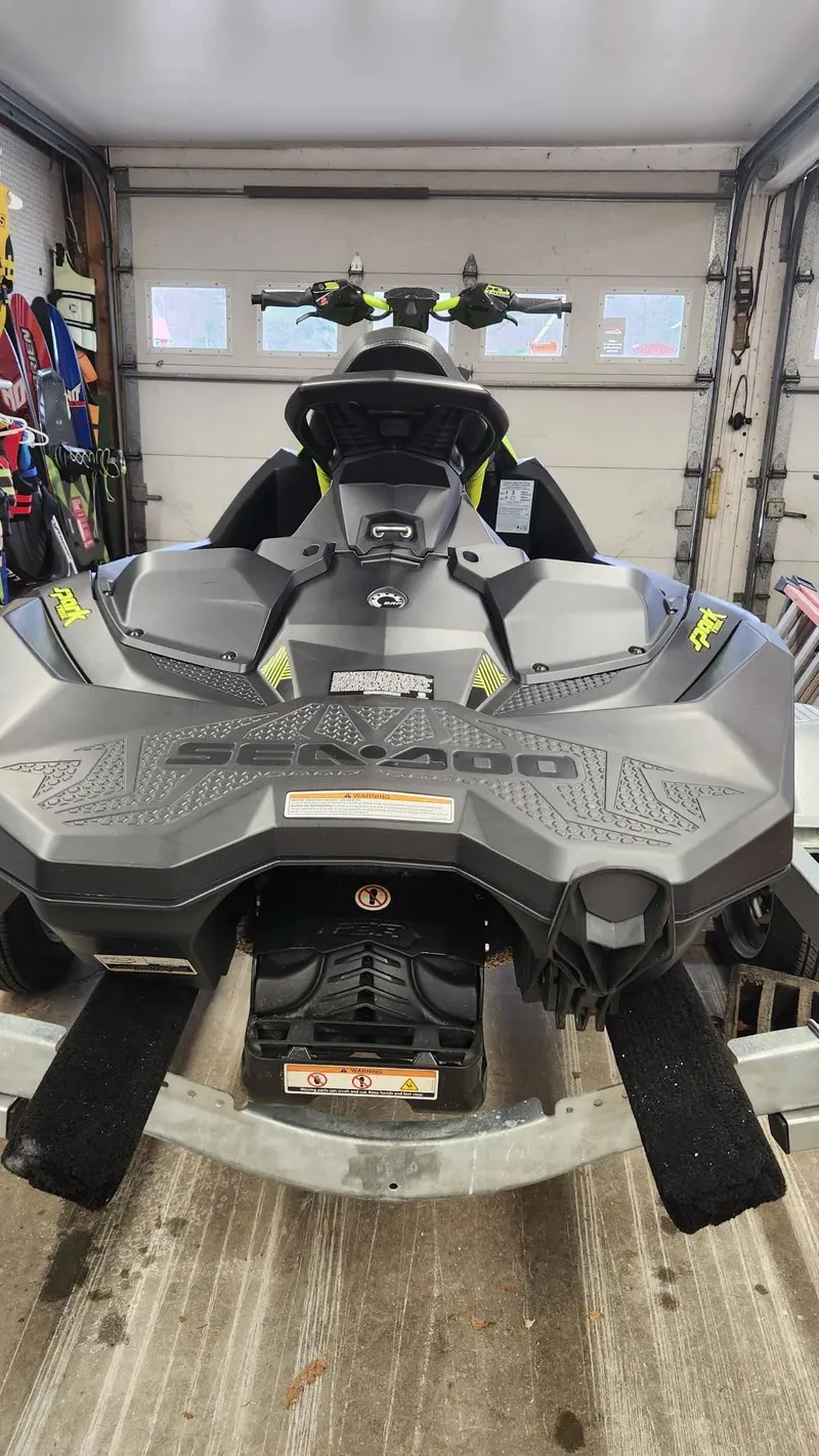 Slide: The Image of 2023 Sea-Doo SPARK 3UP TRIXX SS in a garage, showcasing sleek design and features. - 8