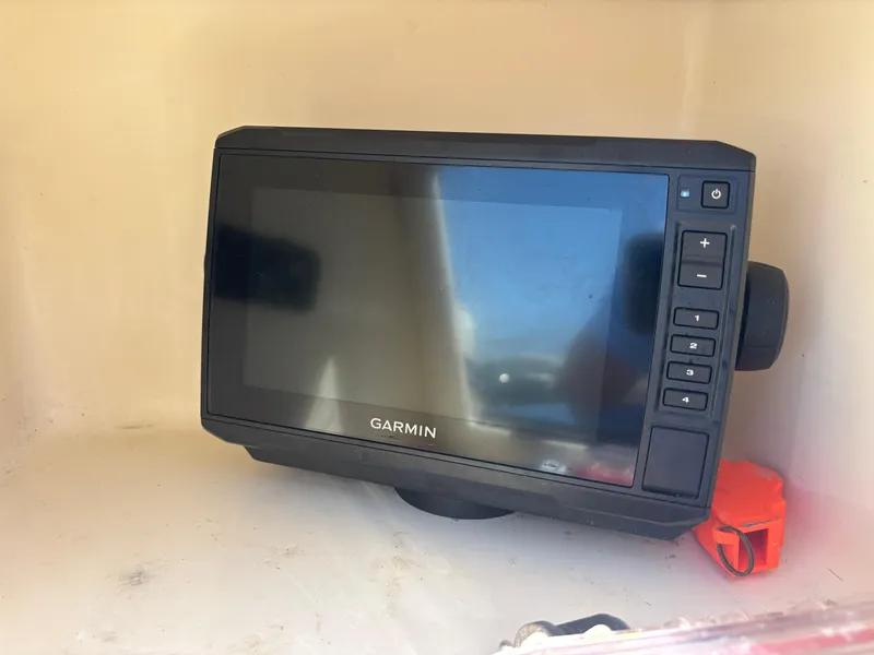 Slide: The Image of Garmin marine GPS device on 2022 Scout 175 Sportfish boat. - 14