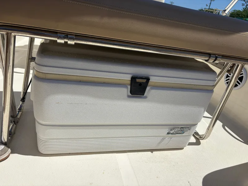 Slide: The Image of Cooler under seat on 2022 Scout 175 Sportfish boat deck. - 7