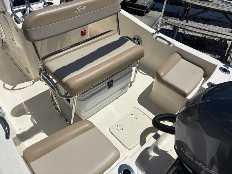Slide: The Image of 2022 Scout 175 Sportfish boat interior with seating and storage compartments. - 8