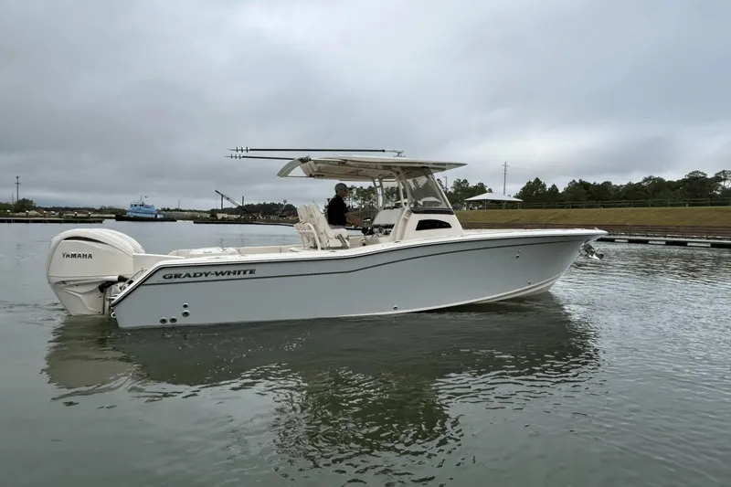 The Image of 2025 Grady-White Canyon 271 boat in indoor storage, featuring Yamaha engine. - 0