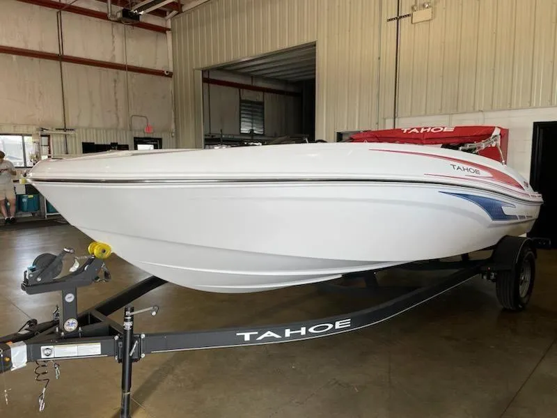 Slide: The Image of 2024 Tahoe T18 boat on trailer in indoor storage facility. - 3