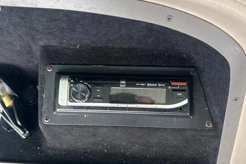 Slide: The Image of Boat stereo system in a 2002 Cobalt 246, featuring Bluetooth and USB connectivity. - 26