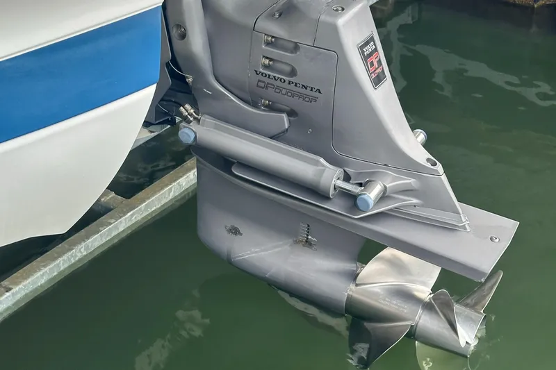 Slide: The Image of Outboard motor of a 2002 Cobalt 246 boat in water, featuring a Volvo Penta drive. - 30