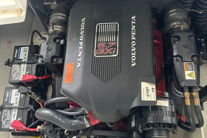 Slide: The Image of Volvo Penta 5.7 GXi engine in 2002 Cobalt 246 boat, featuring dual batteries. - 31