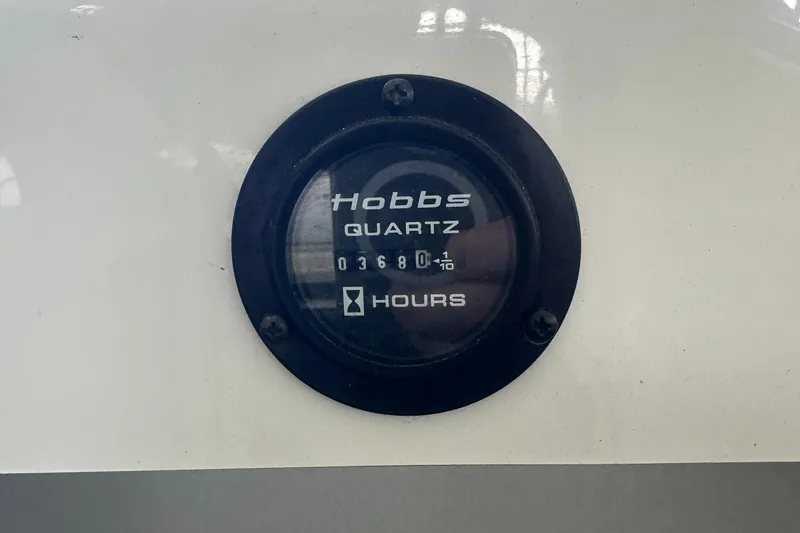 Slide: The Image of Hobbs Quartz hour meter on 2002 Cobalt 246, displaying 3680.1 hours. - 32