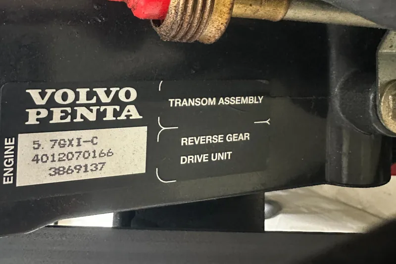 Slide: The Image of Volvo Penta engine label on 2002 Cobalt 246, showing transom assembly and drive unit details. - 33
