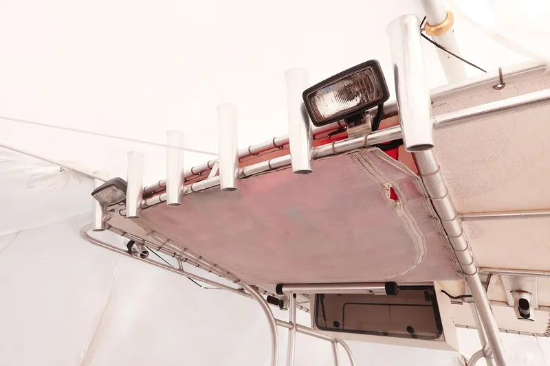 Slide: The Image of 2009 Sailfish 2660 boat with rod holders and overhead light. - 17