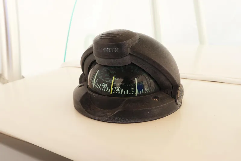 Slide: The Image of Compass on 2009 Sailfish 2660 boat dashboard. - 19