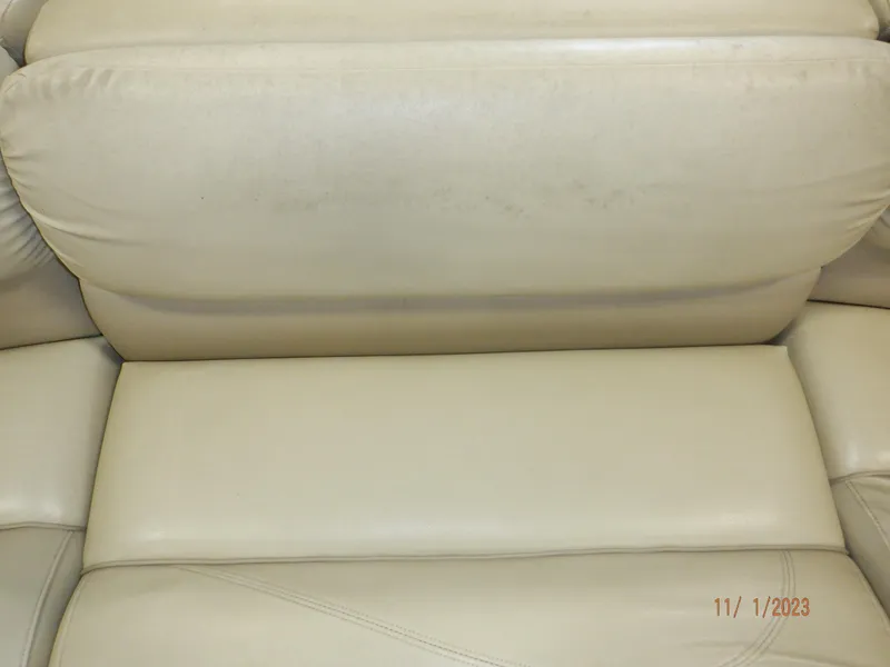 Slide: The Image of Beige leather seat of 2013 Sylvan Signature 8523 LZ boat, close-up view. - 26