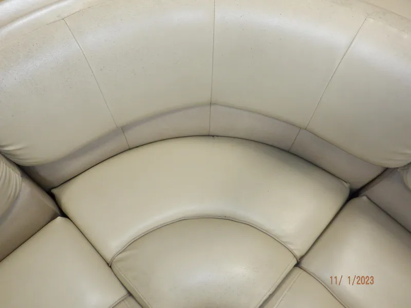 Slide: The Image of Beige leather seating on 2013 Sylvan Signature 8523 LZ boat, close-up view. - 28