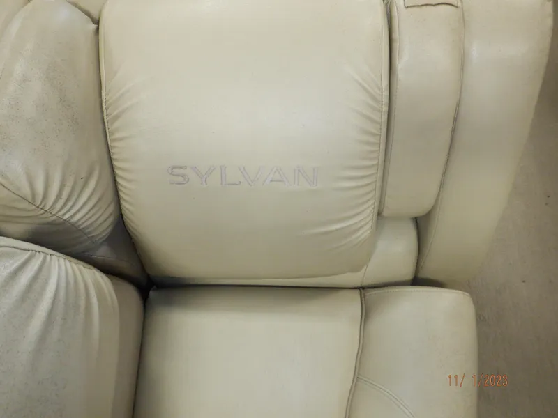 Slide: The Image of Cream leather seat with "Sylvan" embossed, from a 2013 Sylvan Signature 8523 LZ. - 36