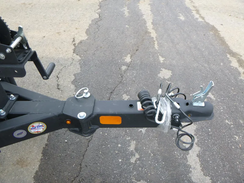 Slide: The Image of Trailer hitch of 2024 Ranger RT178 on asphalt surface. - 4