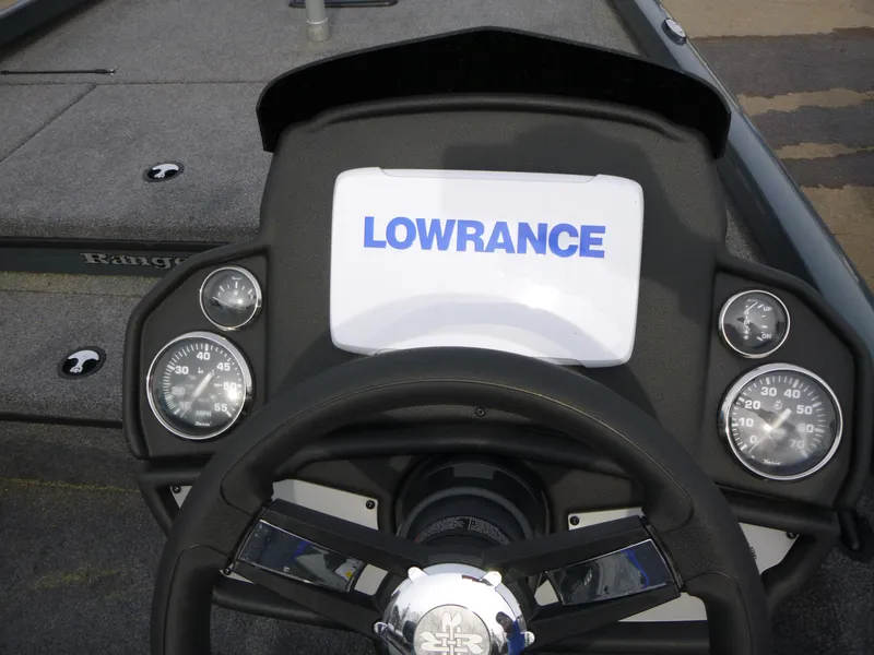 Slide: The Image of 2024 Ranger RT178 boat dashboard with Lowrance display and gauges. - 6
