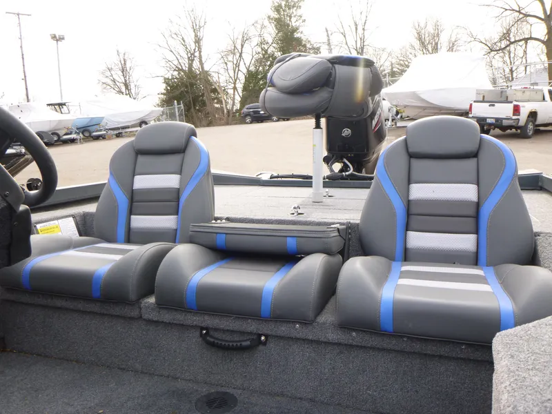 Slide: The Image of 2024 Ranger RT178 boat interior with gray and blue seating. - 7