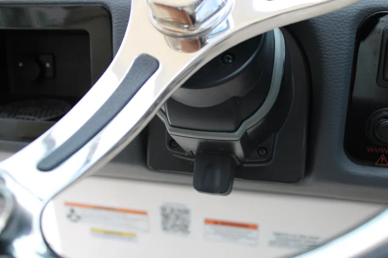 Slide: The Image of 2023 Regal LX6 steering wheel and dashboard close-up. - 43
