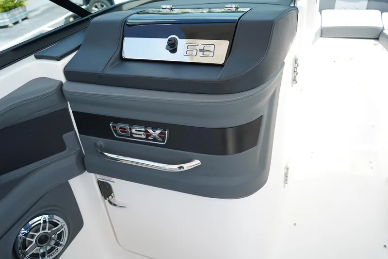 Slide: The Image of 2025 Chaparral 270 OSX boat interior detail with sleek design and modern features. - 18