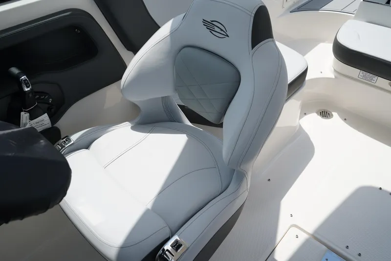 Slide: The Image of 2025 Chaparral 270 OSX boat interior with luxurious white seating. - 30