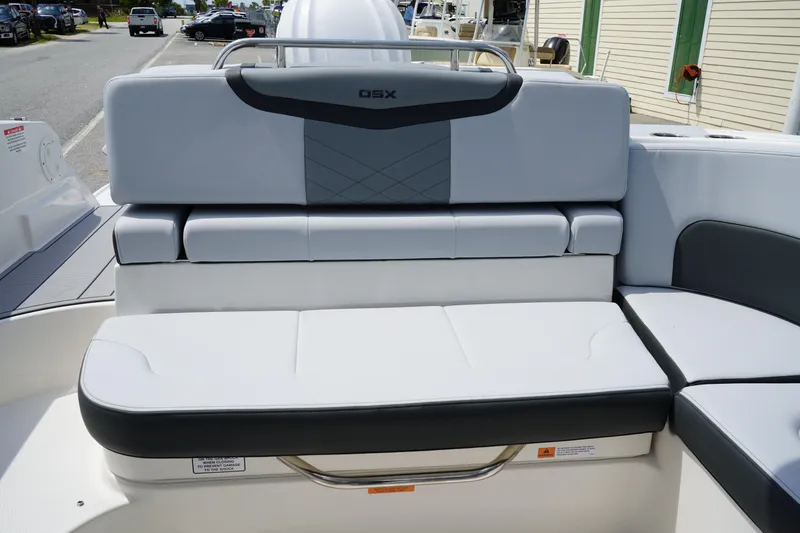 Slide: The Image of 2025 Chaparral 270 OSX boat seating area with modern upholstery design. - 8
