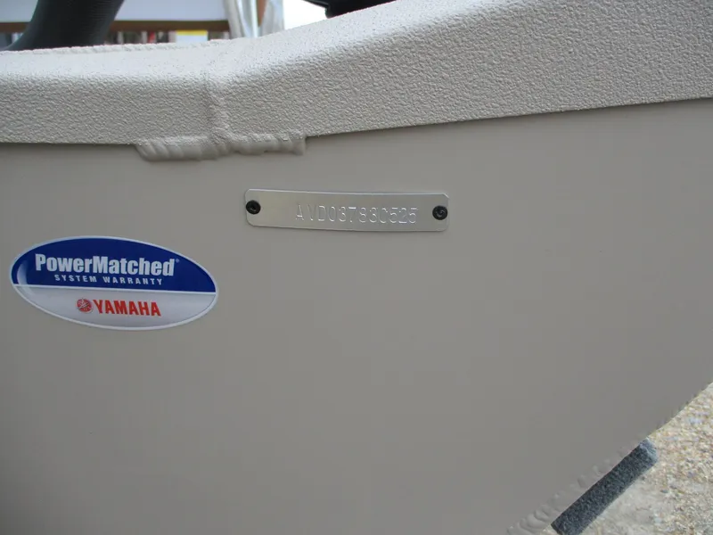 Slide: The Image of Avid 18 Rogue CC 2025 boat with Yamaha PowerMatched warranty label. - 11