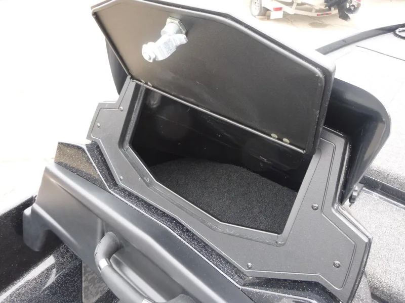 Slide: The Image of Open storage compartment on 2025 Nitro Z21 XL Pro boat. - 10