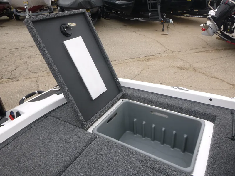 Slide: The Image of Open storage compartment on 2025 Nitro Z21 XL Pro boat. - 13