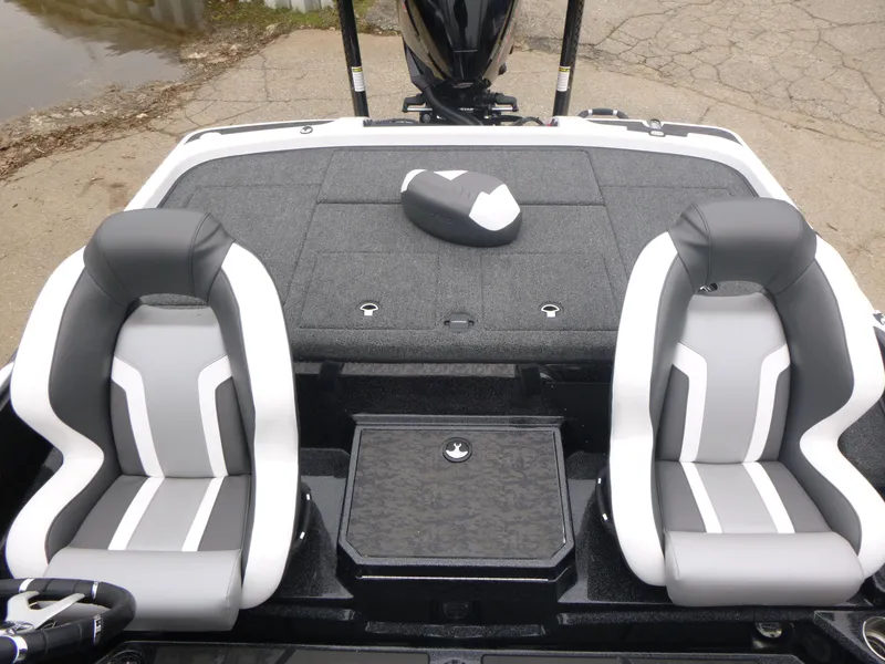 Slide: The Image of 2025 Nitro Z21 XL Pro boat interior with two seats and storage compartment. - 15