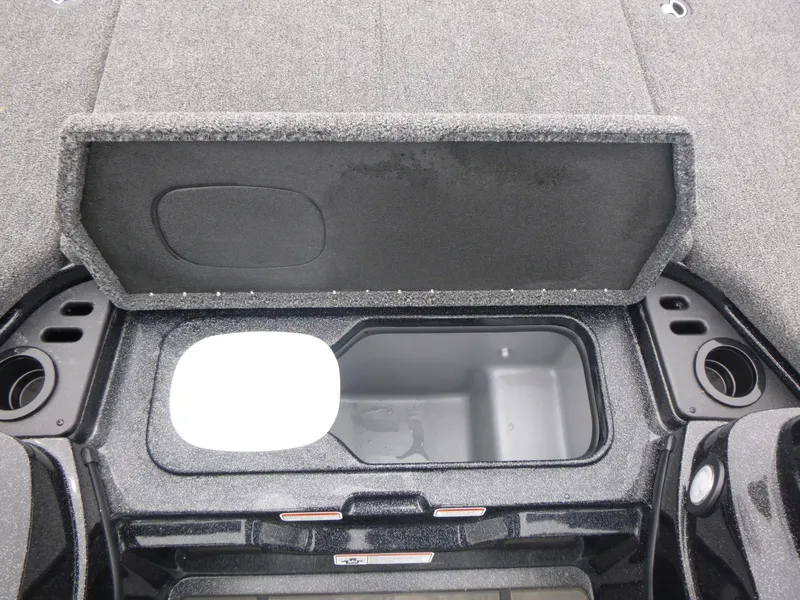 Slide: The Image of 2025 Nitro Z21 XL Pro boat storage compartment with open lid, showcasing interior space. - 20