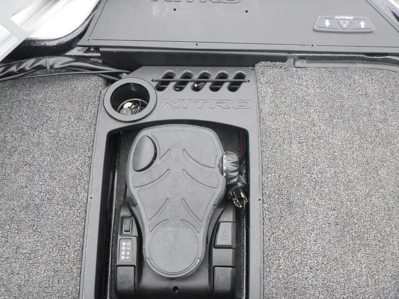Slide: The Image of 2025 Nitro Z21 XL Pro boat deck with control panel and foot pedal. - 25