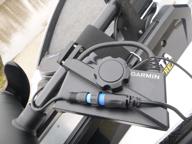 Slide: The Image of Garmin device mounted on 2025 Nitro Z21 XL Pro boat, featuring cables and connectors. - 28