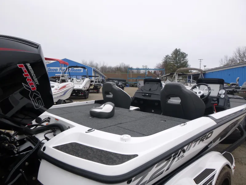 Slide: The Image of 2025 Nitro Z21 XL Pro boat with Mercury Pro XS engine, displayed outdoors. - 3