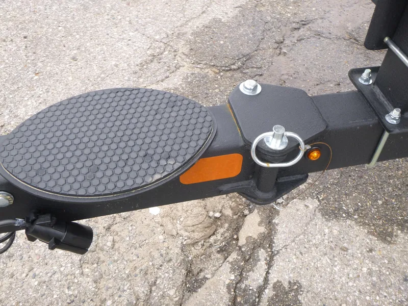 Slide: The Image of Trailer hitch of 2025 Nitro Z21 XL Pro on asphalt surface. - 33