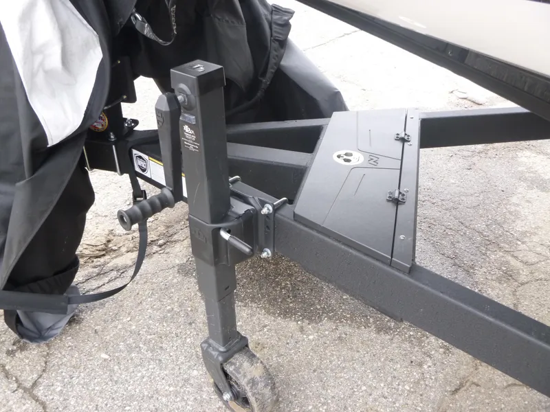 Slide: The Image of Trailer hitch of 2025 Nitro Z21 XL Pro boat on pavement. - 34