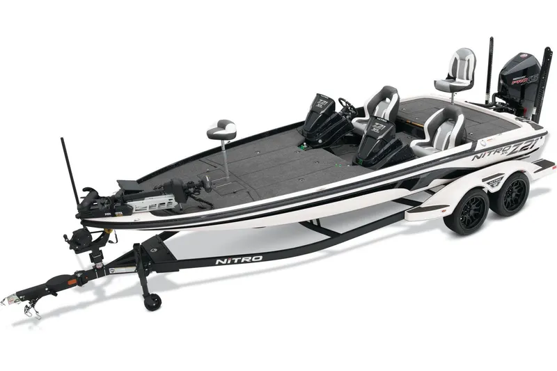 Slide: The Image of 2025 Nitro Z21 XL Pro fishing boat with dual consoles and trailer. - 38